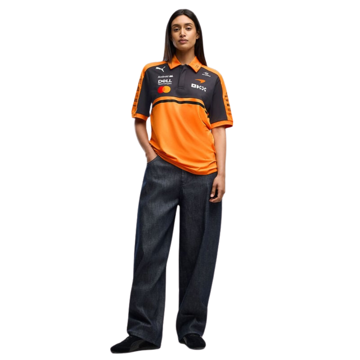 Official McLaren 2026 team polo shirt in orange and dark grey, featuring sponsor logos including OKX, Dell Technologies, and Puma.