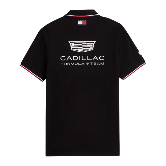 Official Cadillac 2026 team polo shirt in black, featuring sponsor logos including Tommy Hilfiger and Pirelli.