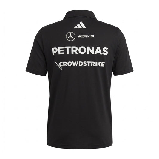 Official Mercedes-AMG Petronas 2026 team polo shirt in dark grey, featuring sponsor logos including INEOS, UBS, and CrowdStrike.