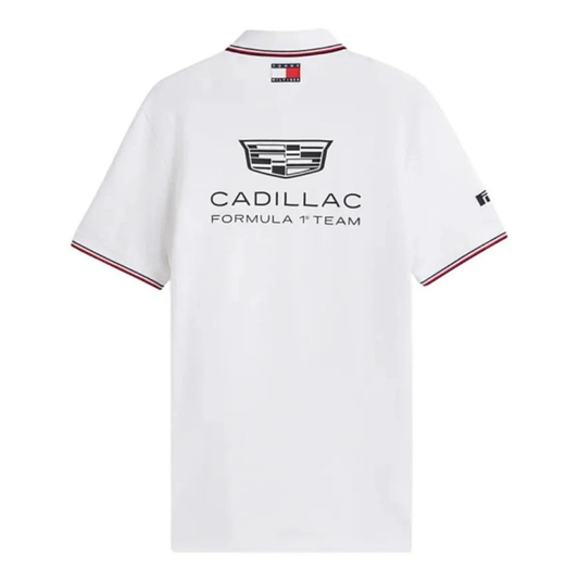 Official Cadillac 2026 team polo shirt in white, featuring sponsor logos including Tommy Hilfiger and Pirelli.