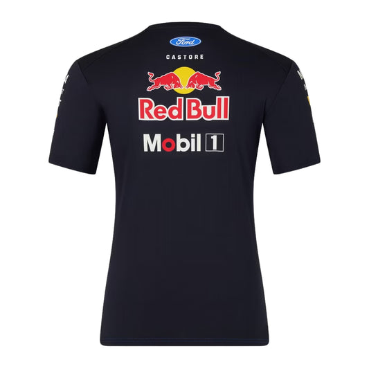 A navy blue and royal blue Oracle Red Bull Racing 2026 team t-shirt featuring a digital camouflage pattern, a crew neck, black sleeves, and prominent partner logos including TAG Heuer, Mobil 1, Ford Racing, and Oracle across the chest.