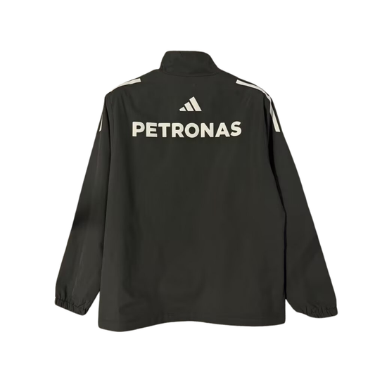 A black Mercedes-AMG Petronas F1 team windbreaker jacket, featuring a full front zipper and the Mercedes-Benz and Petronas logos on the chest.