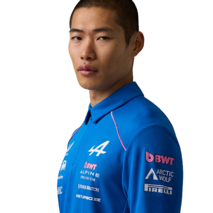 A blue and pink BWT Alpine F1 Team 2026 team t-shirt featuring a crew neck, pink piping accents, and official partner logos including BWT, Eni, and MSC across the chest.