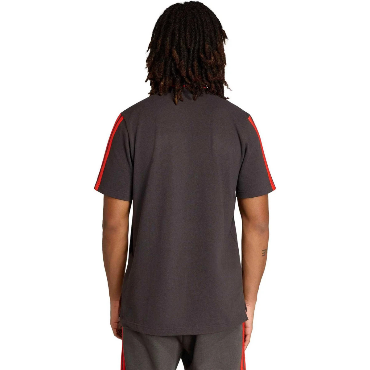 Official Audi 2026 team polo shirt in dark grey, featuring sponsor logos including Revolut, adidas, and Castrol.