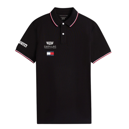 Official Cadillac 2026 team polo shirt in black, featuring sponsor logos including Tommy Hilfiger and Pirelli.