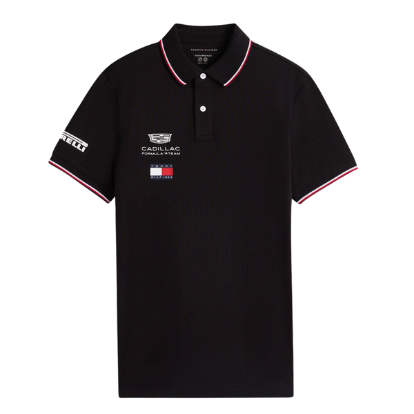 Official Cadillac 2026 team polo shirt in black, featuring sponsor logos including Tommy Hilfiger and Pirelli.