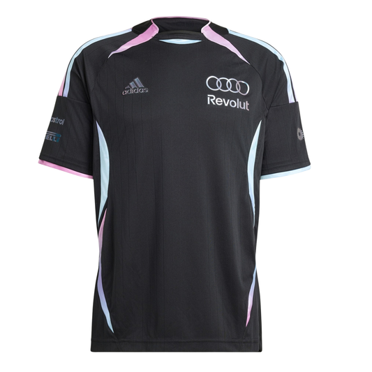 A black, pink, and light blue Audi F1 Team 2026 t-shirt featuring a crew neck with pink and light blue trim, curved gradient side panels, and official partner logos including Adidas and Revolut across the chest.