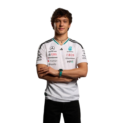 A white Mercedes-AMG Petronas 2026 team t-shirt featuring a V-neck collar with black shoulder stripes and vibrant teal inner trim, and official partner logos including Mercedes-AMG, Petronas, and UBS across the chest.