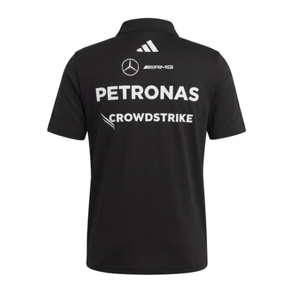 Official Mercedes-AMG Petronas 2026 team polo shirt in dark grey, featuring sponsor logos including INEOS, UBS, and CrowdStrike.