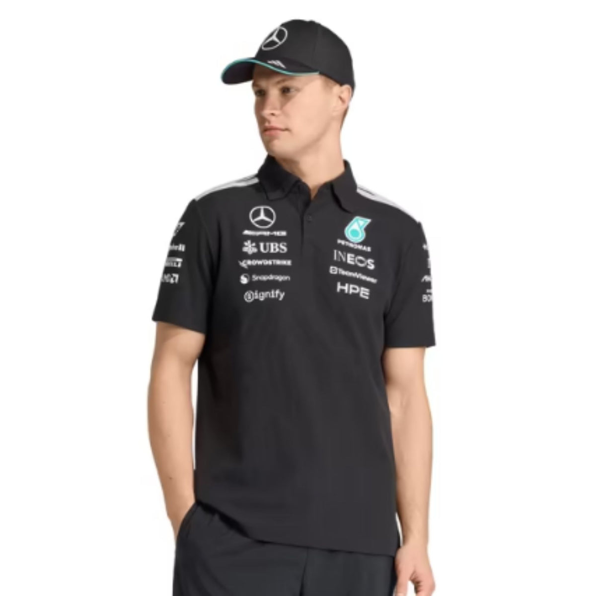 Official Mercedes-AMG Petronas 2026 team polo shirt in dark grey, featuring sponsor logos including INEOS, UBS, and CrowdStrike.