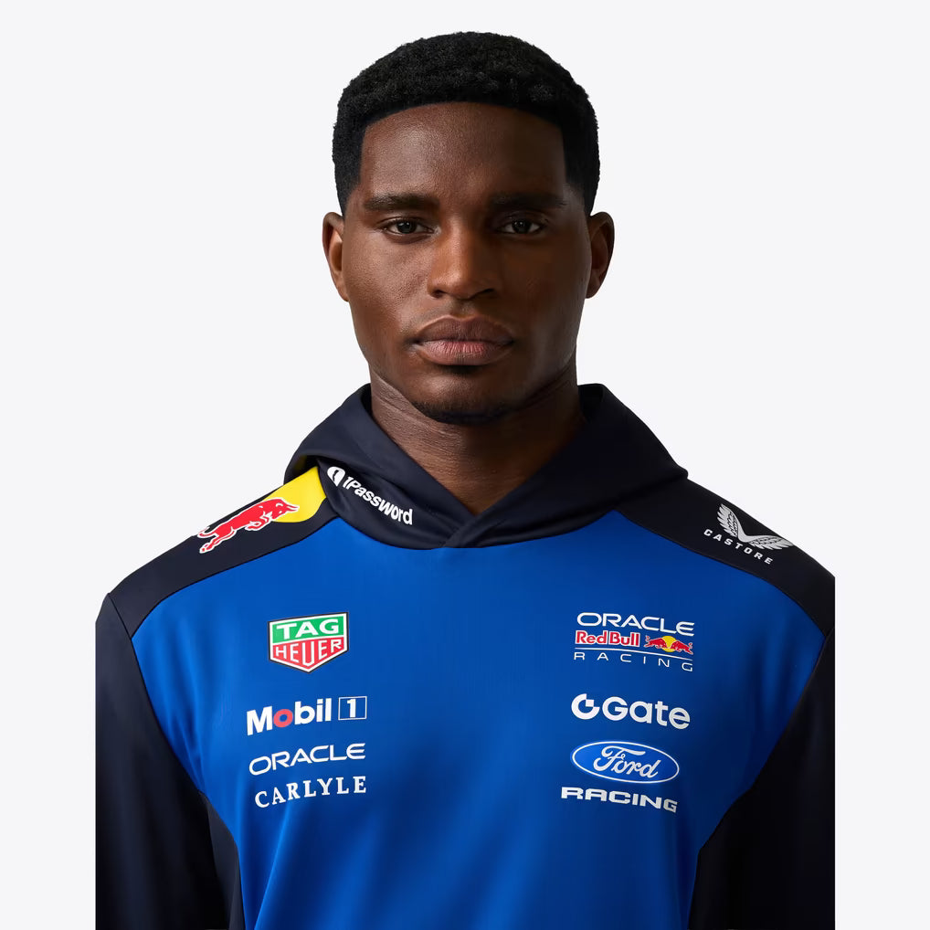 Official Oracle Red Bull Racing 2026 team hoodie in blue and navy, featuring sponsor logos including TAG Heuer, Oracle, and Ford.