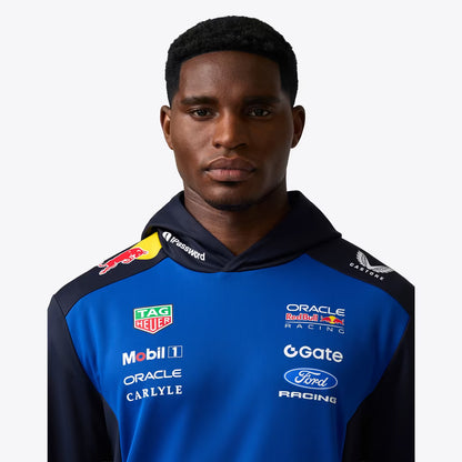 Official Oracle Red Bull Racing 2026 team hoodie in blue and navy, featuring sponsor logos including TAG Heuer, Oracle, and Ford.