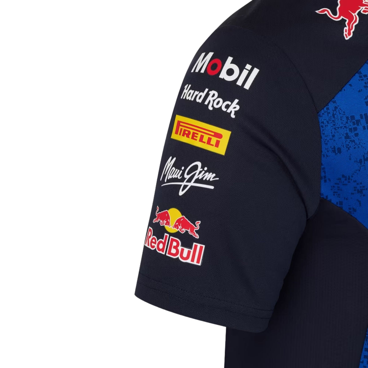 Official Oracle Red Bull Racing 2026 team polo shirt in blue and navy, featuring sponsor logos including Oracle, TAG Heuer, and Ford.