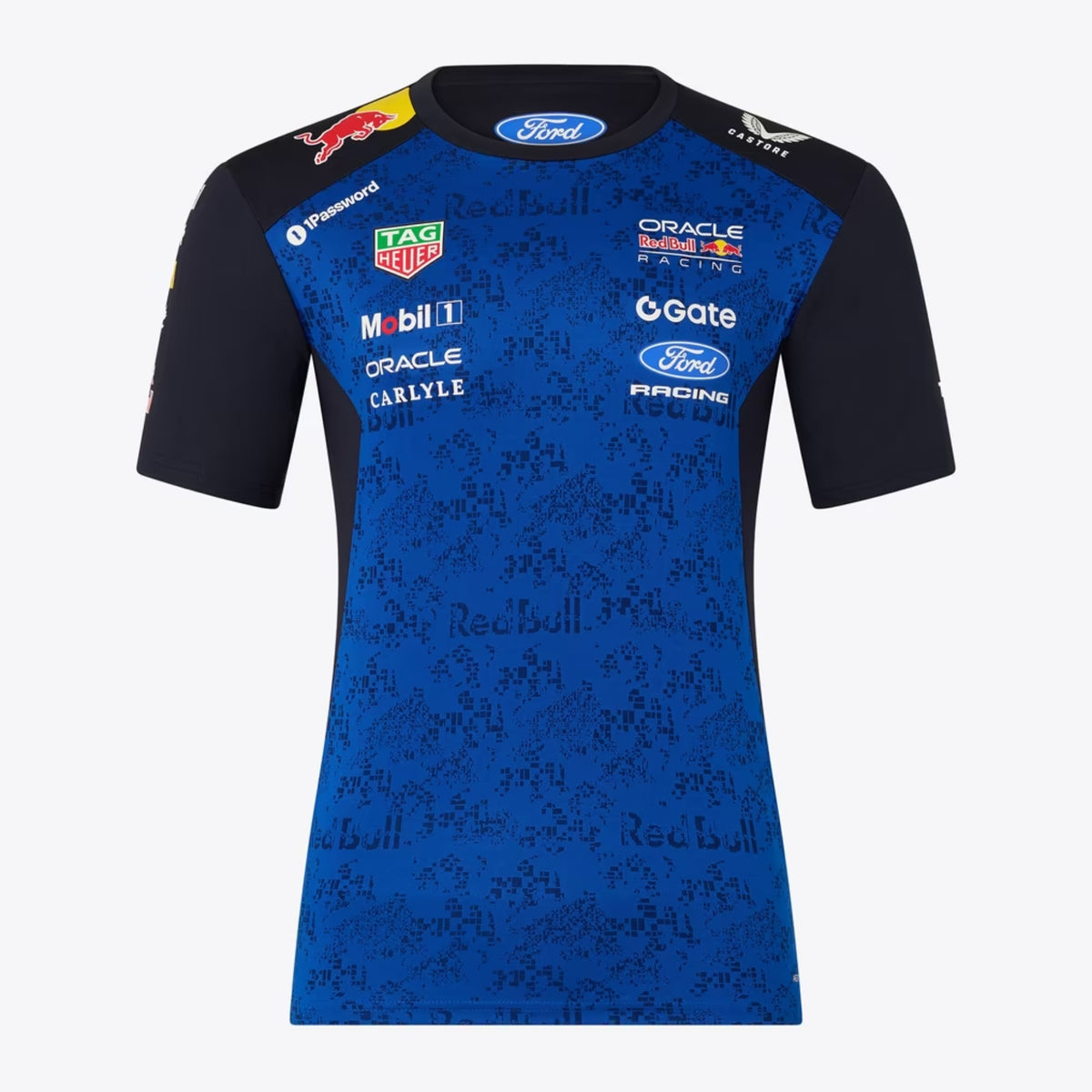 A navy blue and royal blue Oracle Red Bull Racing 2026 team t-shirt featuring a digital camouflage pattern, a crew neck, black sleeves, and prominent partner logos including TAG Heuer, Mobil 1, Ford Racing, and Oracle across the chest.