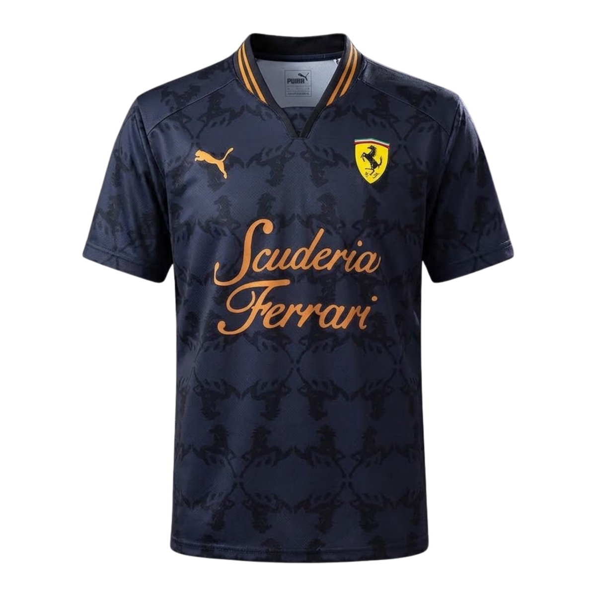 A dark gray and gold Scuderia Ferrari 2026 community t-shirt featuring a subtle all-over Prancing Horse pattern, a V-neck collar, and the classic "Scuderia Ferrari" script across the chest.