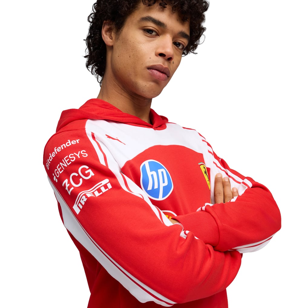 Official Scuderia Ferrari 2026 team hoodie in red and white, featuring sponsor logos including HP, Shell, and UniCredit.