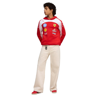 Official Scuderia Ferrari 2026 team hoodie in red and white, featuring sponsor logos including HP, Shell, and UniCredit.