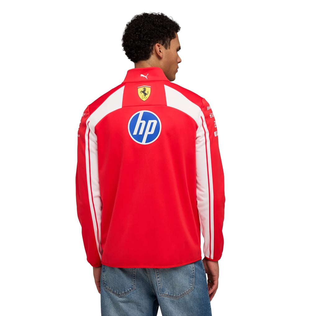 Official Scuderia Ferrari 2026 team jacket in red and white, featuring sponsor logos including HP, Shell, and UniCredit.