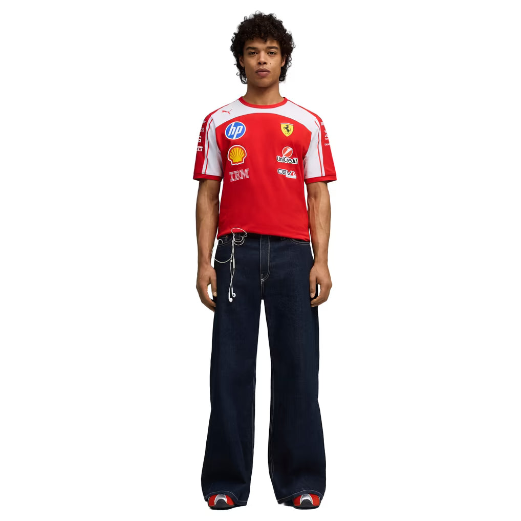 A red and white Scuderia Ferrari 2026 team t-shirt featuring a crew neck, white raglan shoulder panels, and official partner logos including HP, Shell, and UniCredit across the chest.